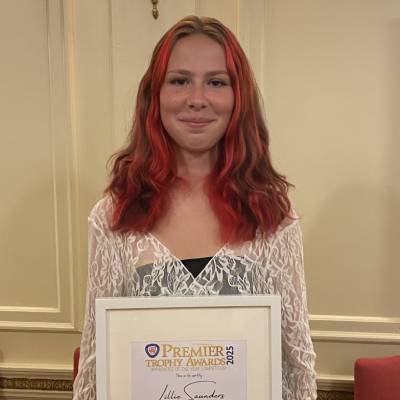 Coleg Llandrillo student Lillie Saunders with her certificate for finishing third in the PDA Apprentice of the Year competition